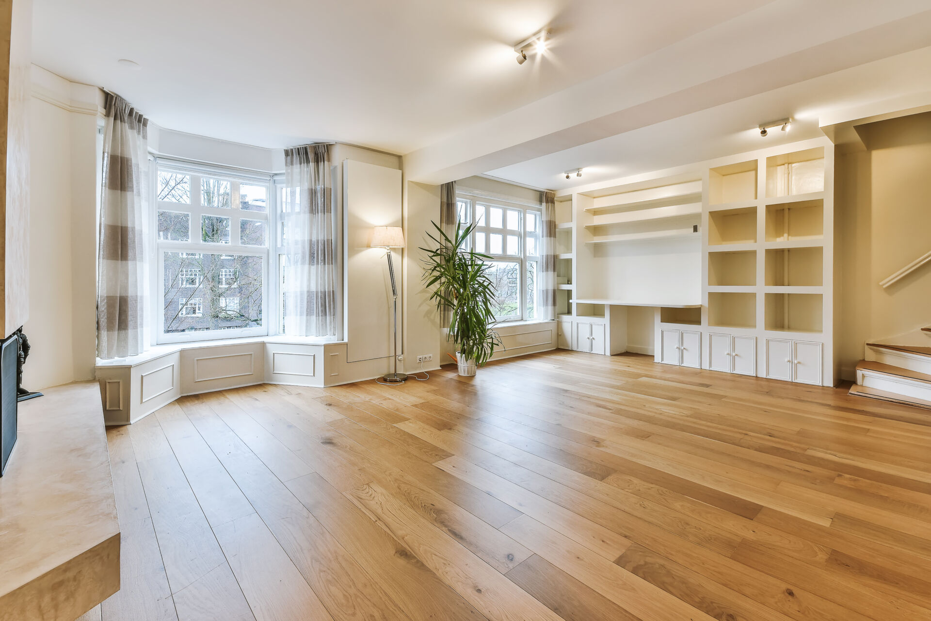 Laminate flooring in empty living room