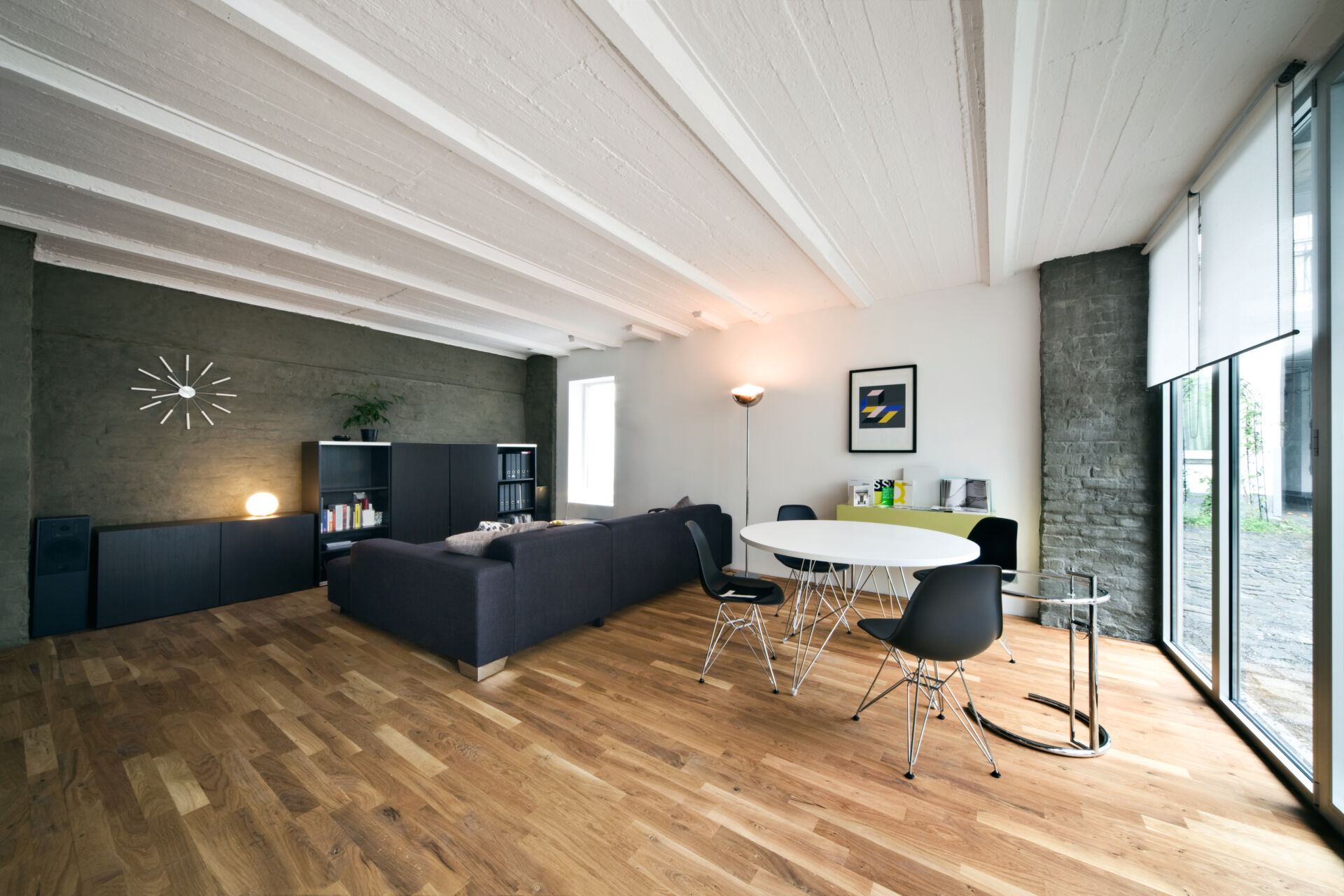Lounge and dining room with laminate flooring installed